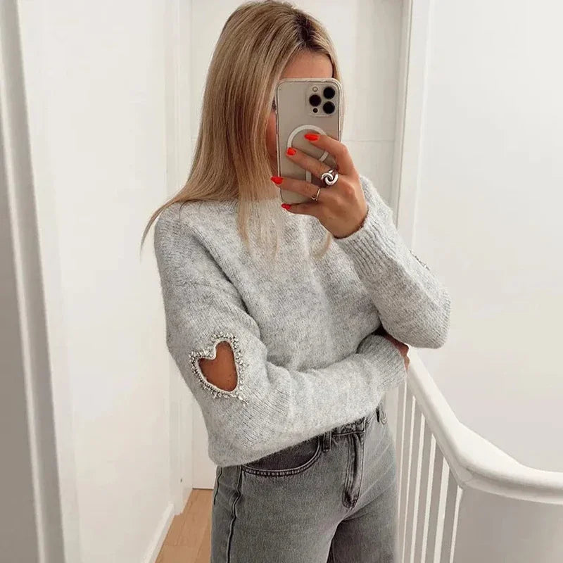 Clementine | Heart Cutout Sweater Trendy og behagelig modetrøje til kvinder