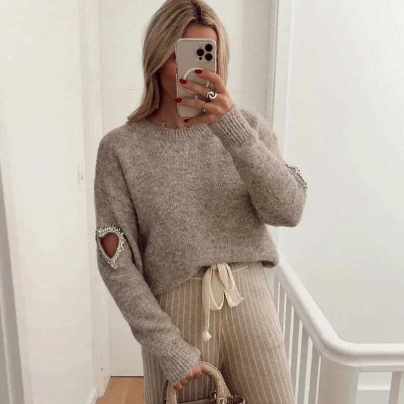 Clementine | Heart Cutout Sweater Trendy og behagelig modetrøje til kvinder